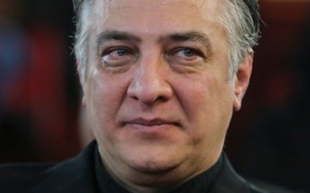 تصویری از ایرج نوذری در کنار دخترانش